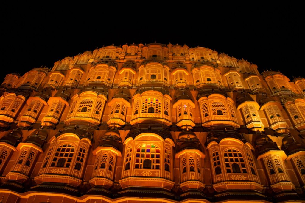 Jaipur skyline with royal palace silhouette representing spiritual energy in the city